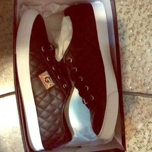 NEW in box. Women’s size 9 GUeSS Sneakers